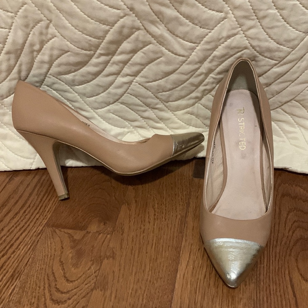 Restricted nude pointed toe pump